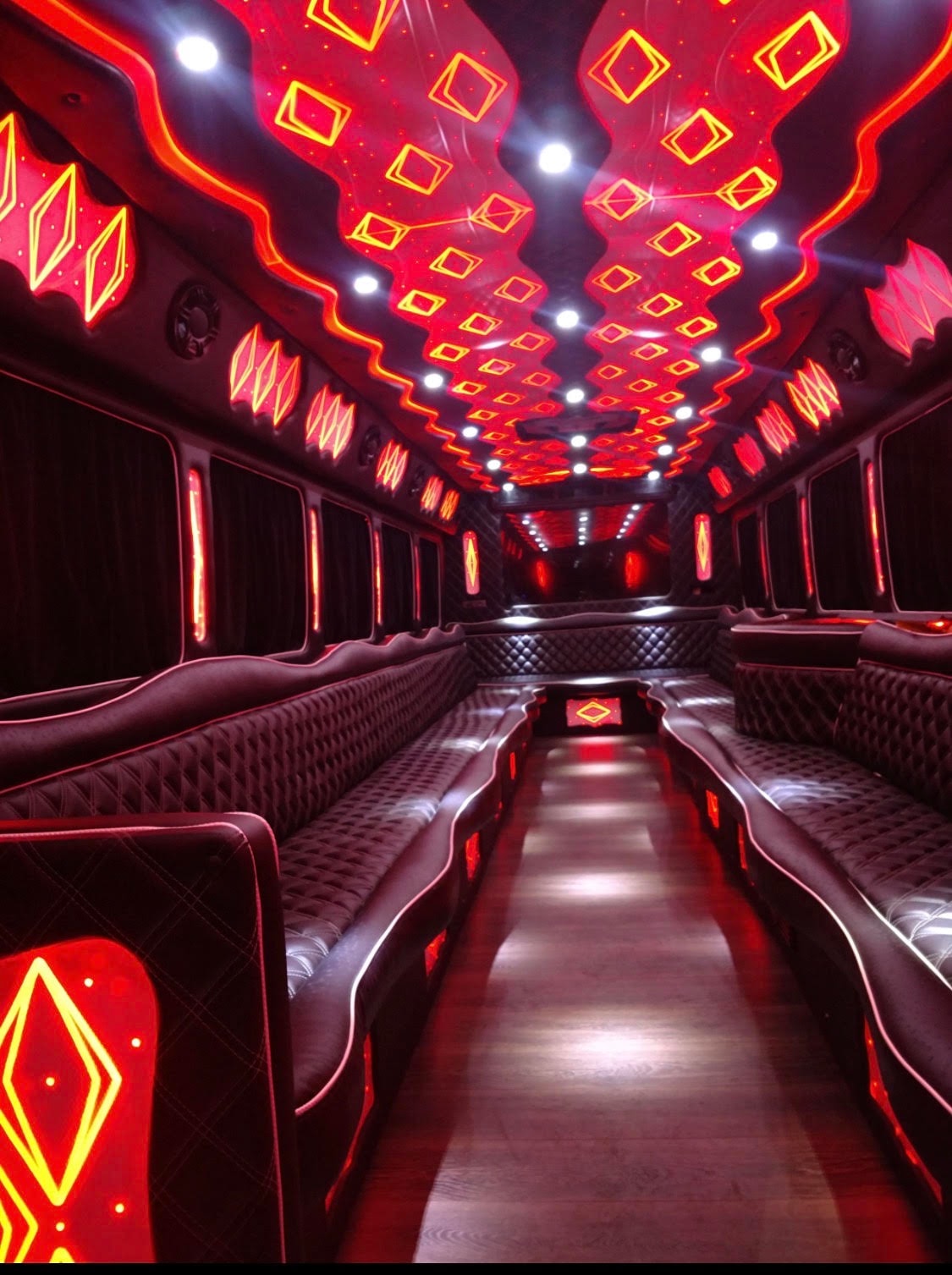 Party bus interior with people celebrating